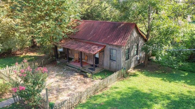 1- Charming 1900 Cottage on Half an Acre. $140,000. To see the cozy interior, look down below.