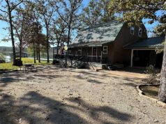 Lakefront Cabin with Private Dock & Boats. $160,000