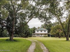 Love the long driveway! Fixer upper alert! Over two acres in North Carolina. $149,900