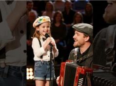 A cute little girl sings to her father