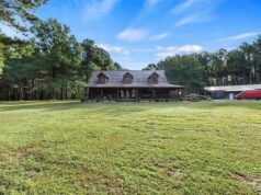 Log Home Property with 112.21 Acres in Carterville, Illinois