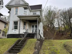Spacious Four-Bedroom Opportunity on W Onondaga St: A Double-Lot Property with Exceptional Potential