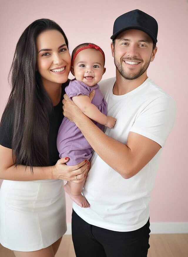 Young couple put daughter inside the fir... See more