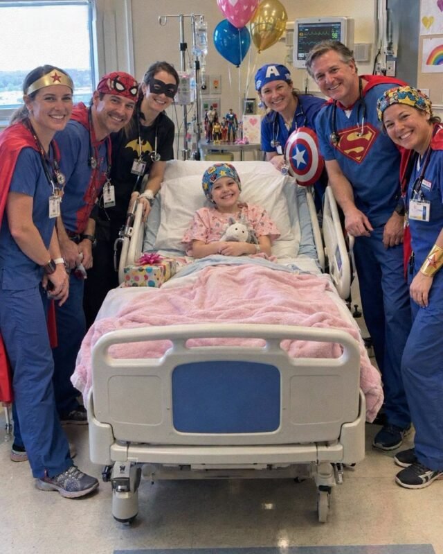 Every Doctor Treating My 7 Year Old Daughter for Cancer Dressed as Superheroes for Her Birthday She Was Crying with Joy When Her Oncologist Knelt Down and Said, There s One Part of Today Your - Copy
